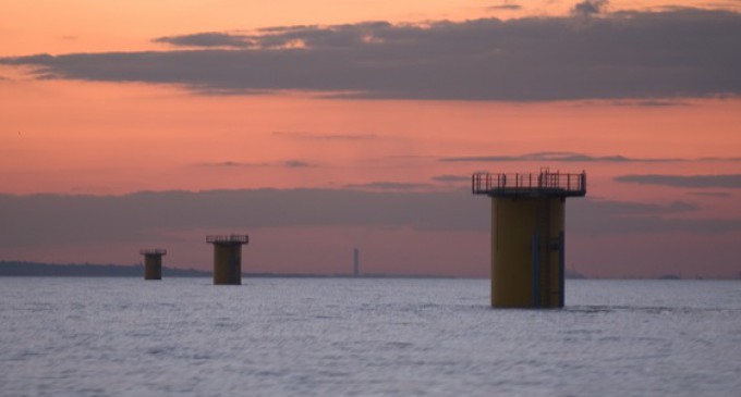 Elsam is erecting UK largest offshore wind farm at Kentish Flats, situated on the southern side of the outer Thames estuaryThe Kentish Flats wind farm will comprise 30 efficient wind turbines capable of producing up to 3 MW of electricity each, so that the total output of the wind farm could be up to 90 MW. Once erected on Kentish Flats, the farm will set a dual record: the 30 turbine project will host the largest wind turbine so far installed in the UK, and the project will be the largest wind farm in the UK, at 90 MW rated capacityThe picture is in 300 dpi resolution and available free of charge. If published, Elsam must be credited as the source.Windfarm Construction Kentish Flats Whitstable Kent Construction Ship Resolution with a transition piece in place at the stern