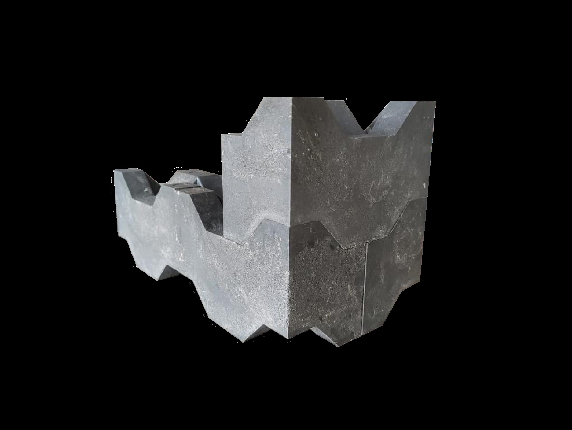 De bouwsteen heeft een unieke vorm, met vertandingen boven en onder. Foto: Unibrick