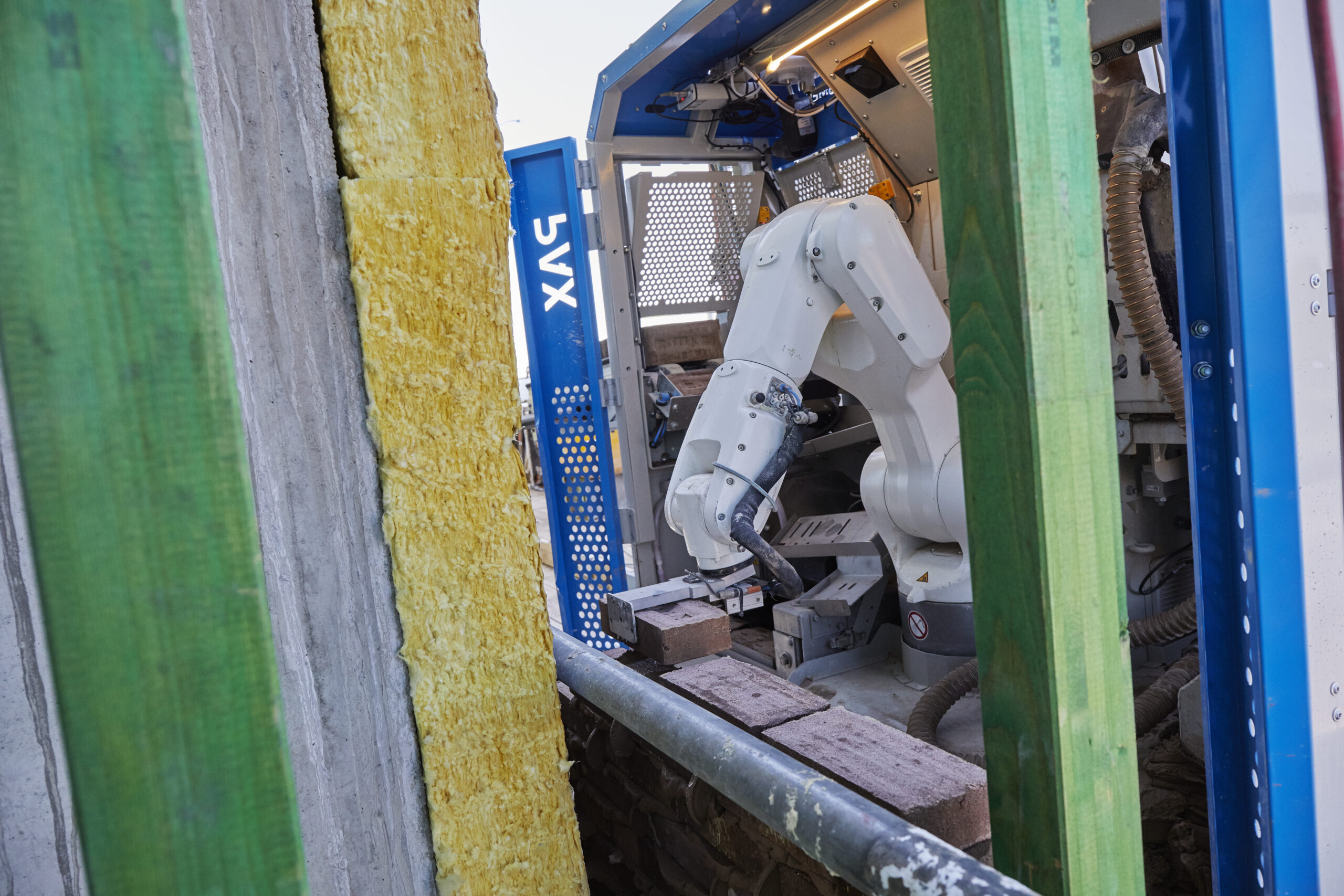 Robot Pax verzorgt bijna al het metselwerk van de twaalf lagen tellende woontoren van Cartesius Utrecht. Foto: Christiaan Krouwels